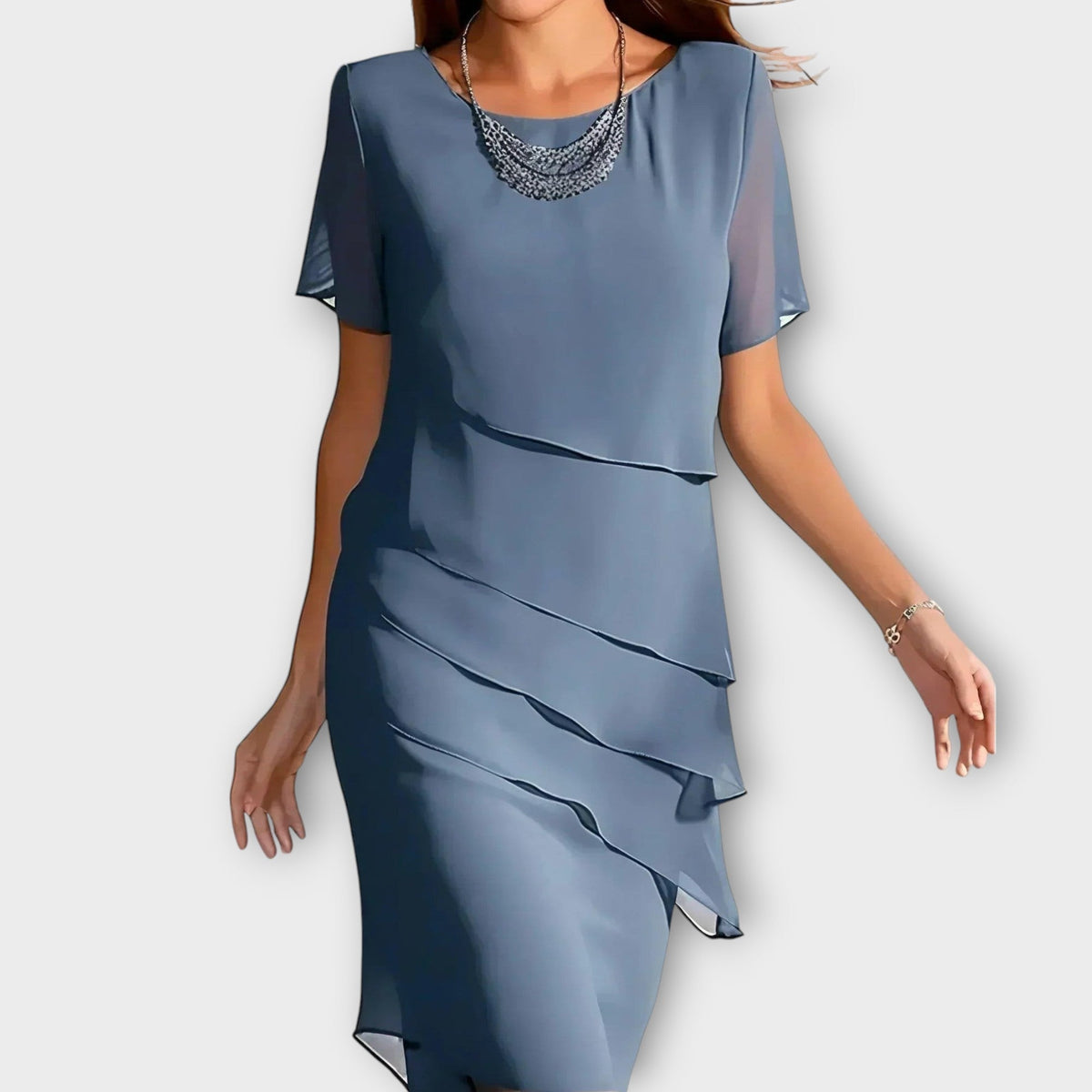 Blue tummy-concealing dress with short sleeves, draped layered front and midi length.