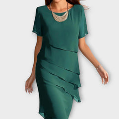 Green tummy-concealing dress with short sleeves, draped layered front and midi length.