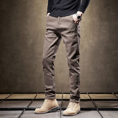 Khaki slim-fit pants with zipper fly and slim legs