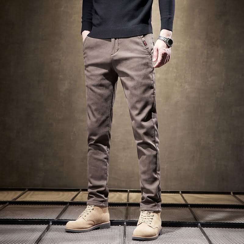 Khaki slim-fit pants with cuffs and front pockets