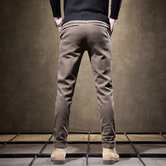 Khaki slim-fit pants back view with rear seam