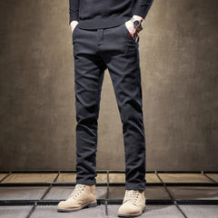 Black slim-fit pants full length with zipper fly and tapered legs