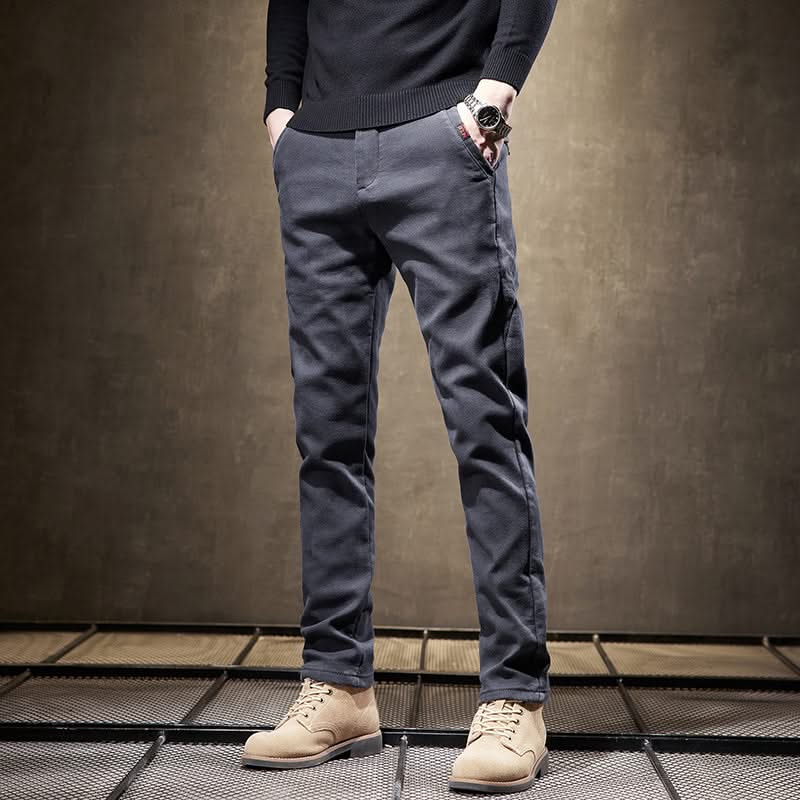 Dark gray slim-fit pants front view with tapered legs