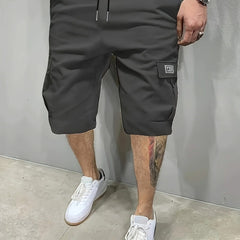 Charcoal utility shorts with drawstring waist and side cargo pockets