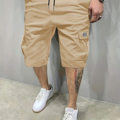 Ashford utility shorts, tan drawstring waist with side cargo pockets and stitched hem