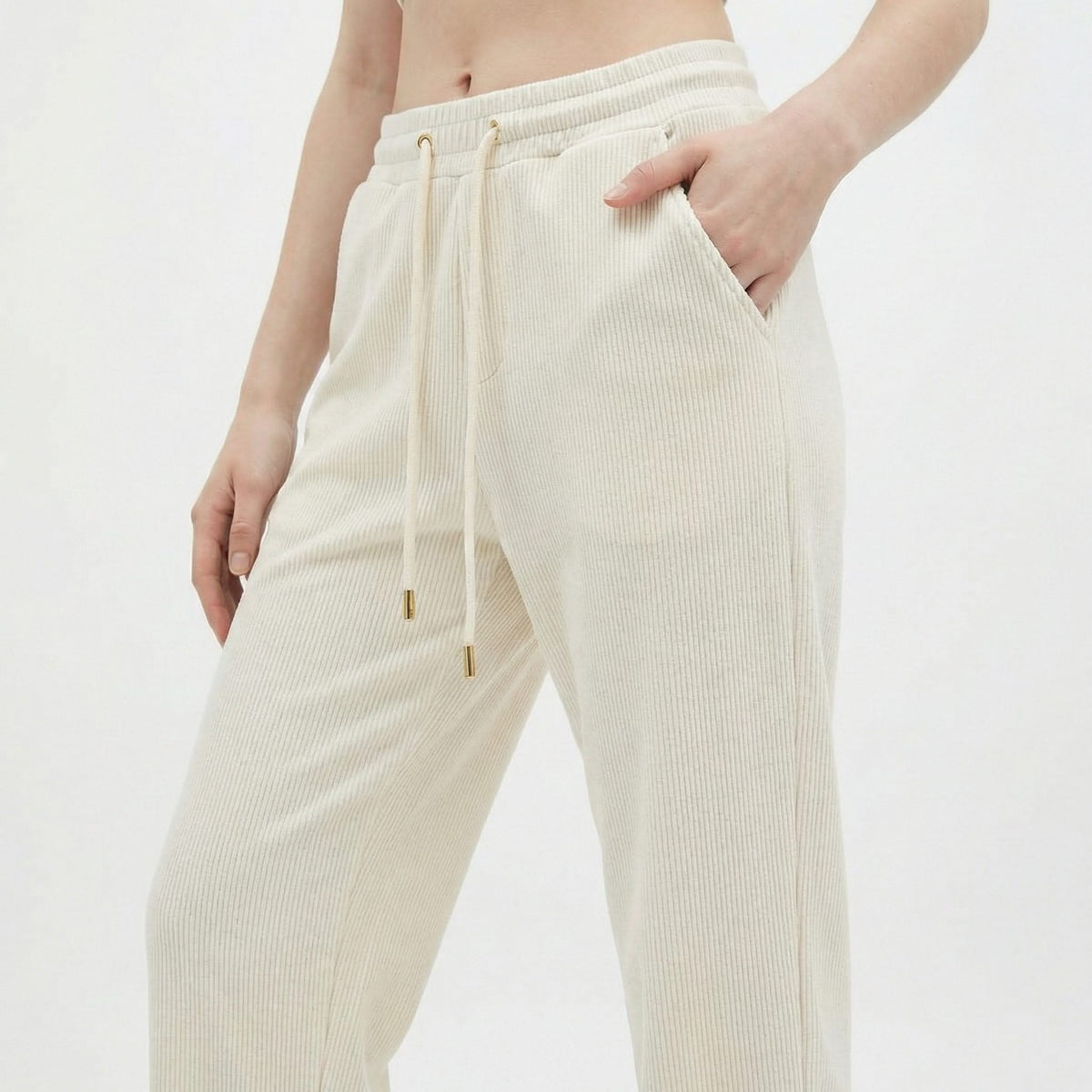 Cream cotton drawstring pants with elastic waistband