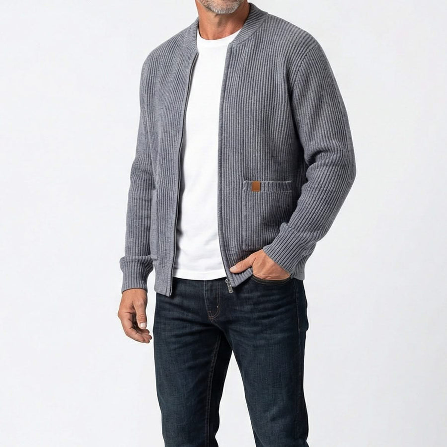 Grey rib knit zip-up jacket on model with stand collar and front pocket