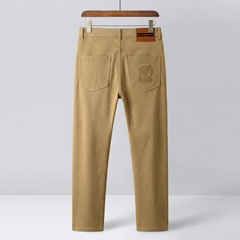 Khaki premium pants on hanger with front center crease and two side pockets