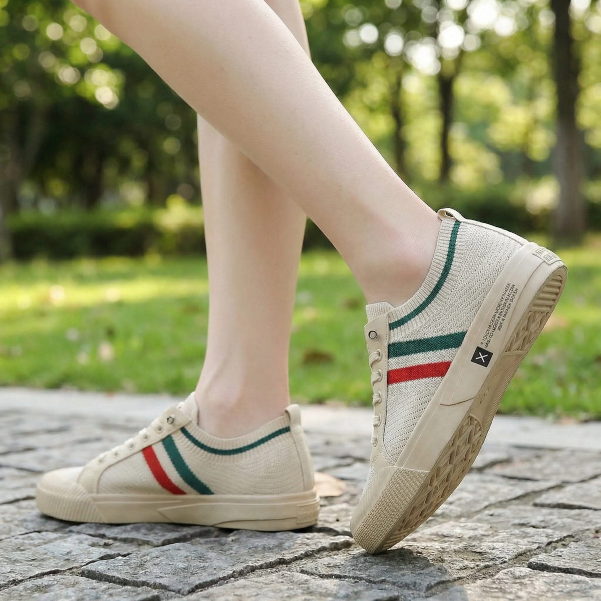 Light knit low-top sneakers with multicolor stripe panel and rubber sole