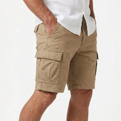 Beige cargo shorts, side view with flap pocket and stitched belt loops