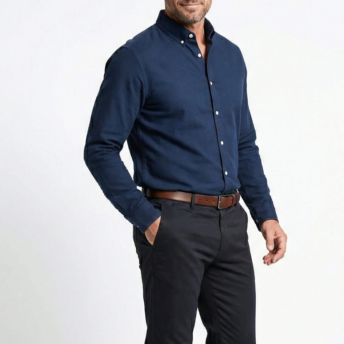 Navy cotton-linen button-up shirt worn by model with point collar, chest pocket, long sleeves