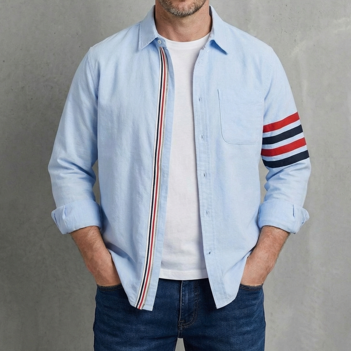Light blue cotton button-up shirt with striped placket and sleeve