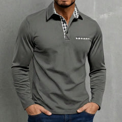 Long-sleeve polo shirt in dark grey, half-zip placket, gingham inner collar, chest pocket.