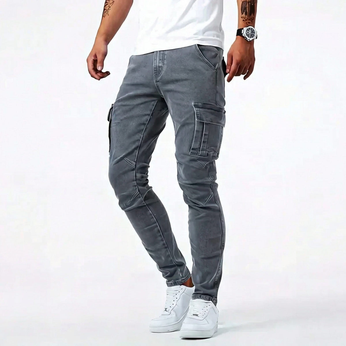 Utility jeans in dark grey wash with cargo-style side pockets and cuffed hems