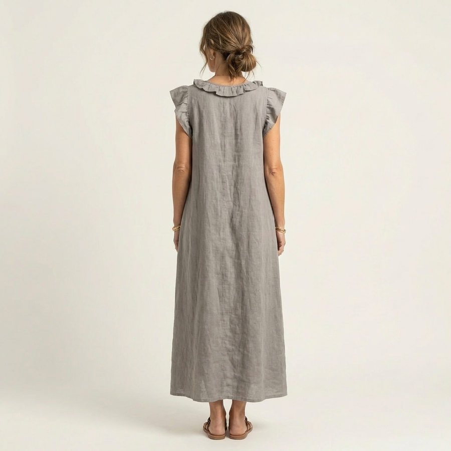 Gray linen maxi dress with ruffled back yoke and short flutter sleeves.