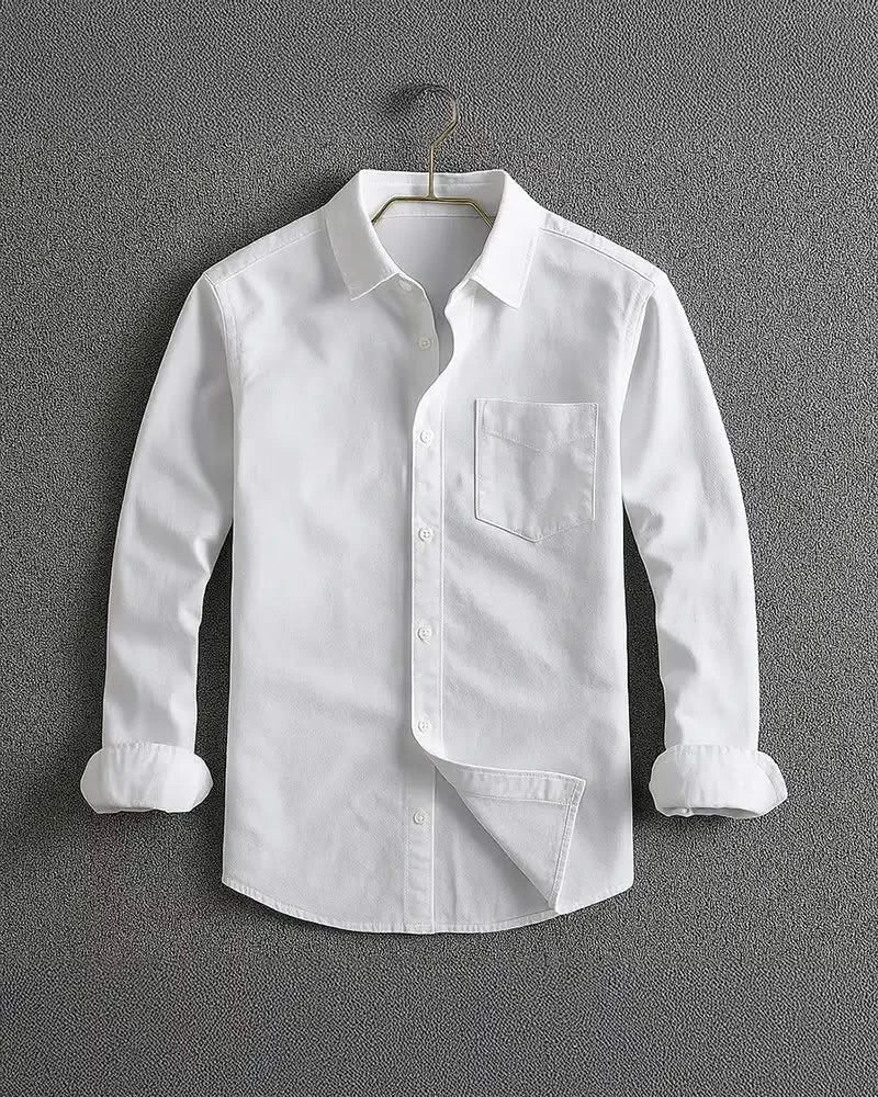 White long-sleeve button-up shirt with chest pocket and diagonal front panel.