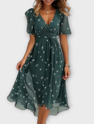 Floral wrap midi dress in dark green with V-neck and short sleeves, flared skirt