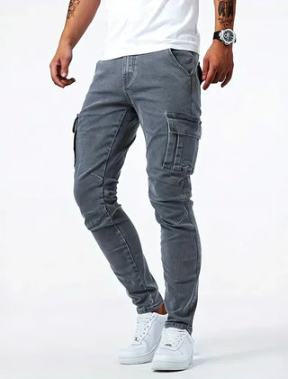 Dark grey utility jeans with stitched cargo pockets and tapered legs
