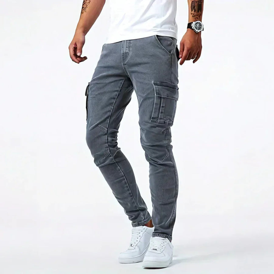 Dark grey utility jeans with stitched cargo pockets and tapered legs
