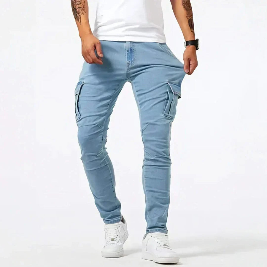 Blue cargo jeans with side cargo pockets and tapered slim fit