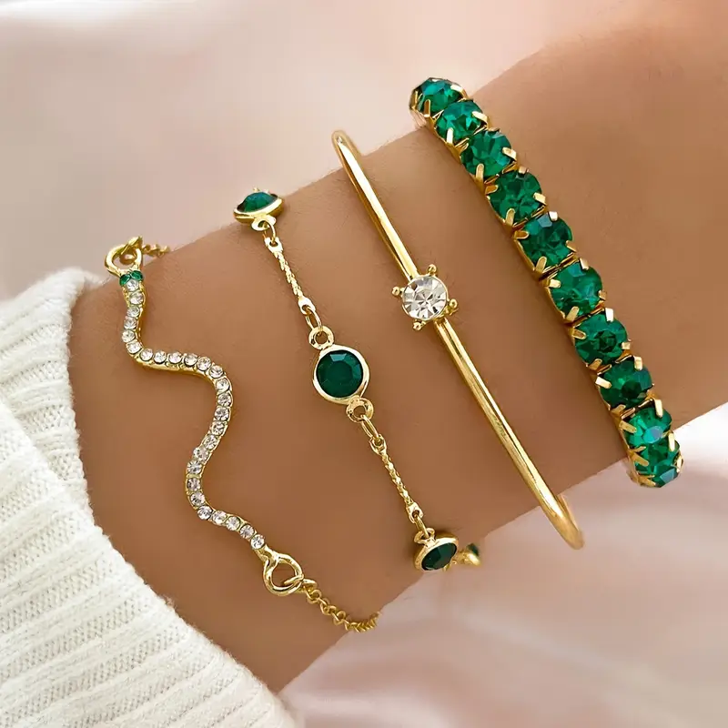 Vintage zirconia bracelet set with green rhinestones and gold-tone chain and cuff