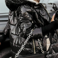 Leviana™ long quilted jacket in black with hood, full front zip, and diamond quilting
