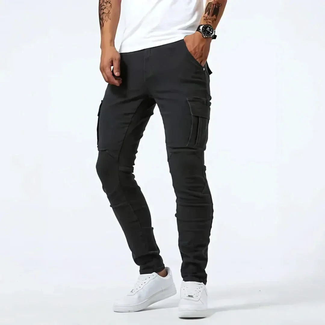 Black utility jeans with cargo-style flap pockets and tapered legs