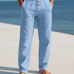 Light blue linen trousers with button front and drawstring waist, relaxed straight legs