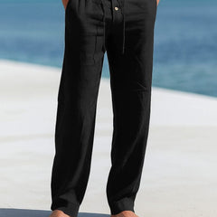 Black linen trousers with button front and drawstring waist, relaxed straight legs