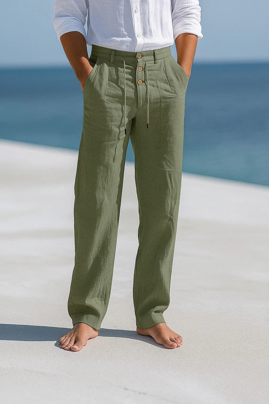 Military green linen trousers with button front and drawstring waist, relaxed straight legs