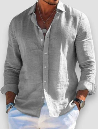 Grey linen button-up shirt with long sleeves and classic collar