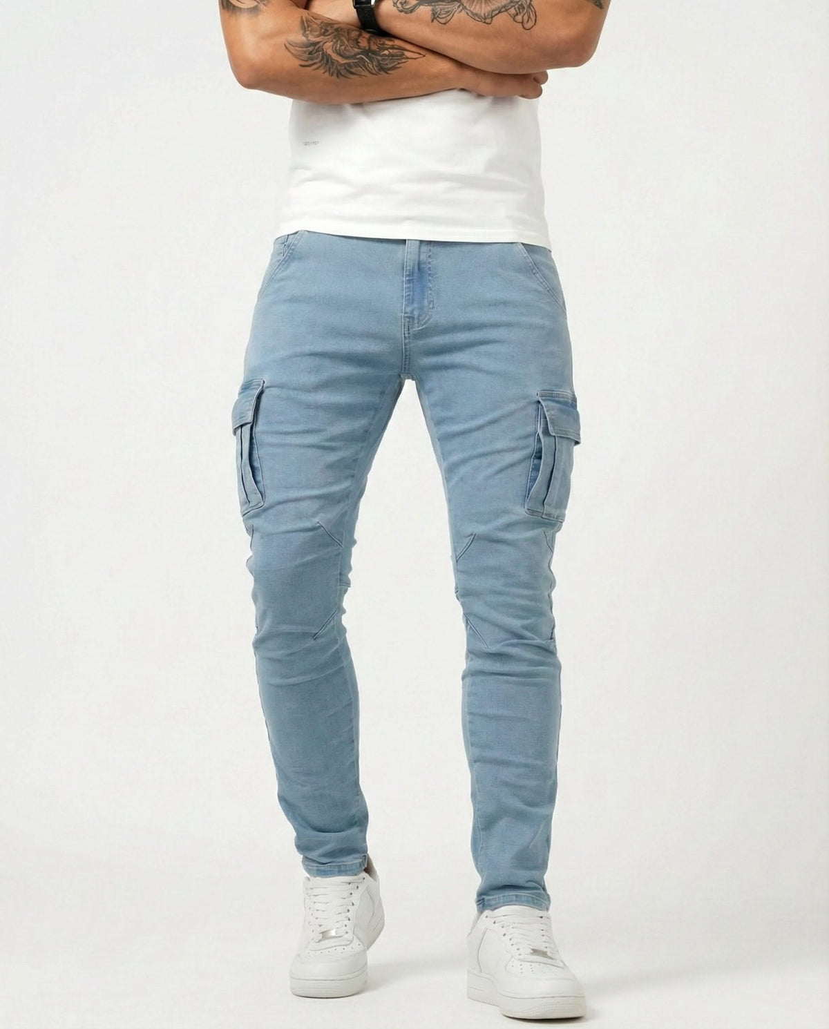 Men's light blue cargo trousers with side cargo pockets and slim tapered fit
