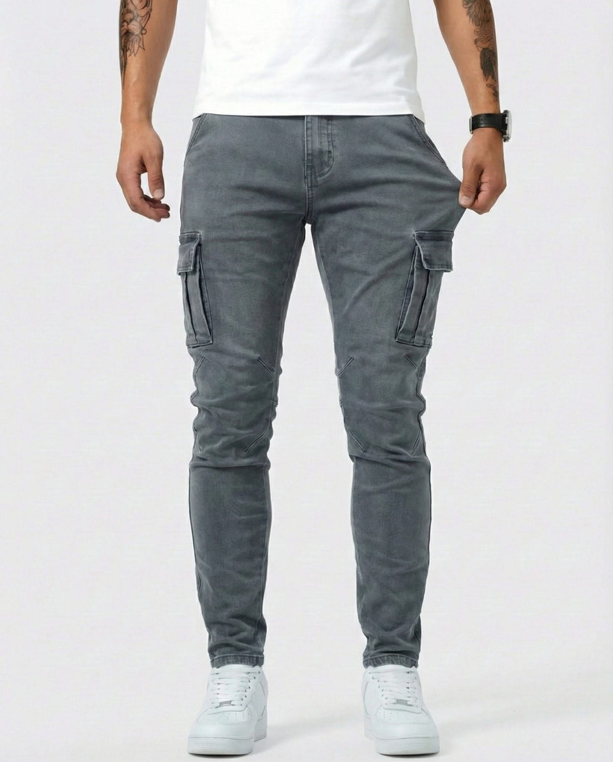 Men's dark grey cargo trousers with side cargo pockets and tapered legs