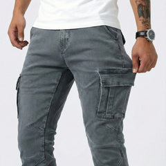 Men's dark grey cargo trousers close-up of cargo pocket details