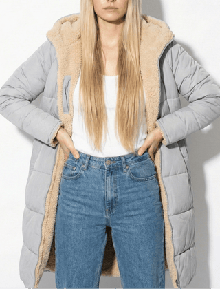 Gray long quilted coat with tan sherpa collar and zip front