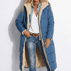 Navy long quilted coat with tan sherpa collar and zip front