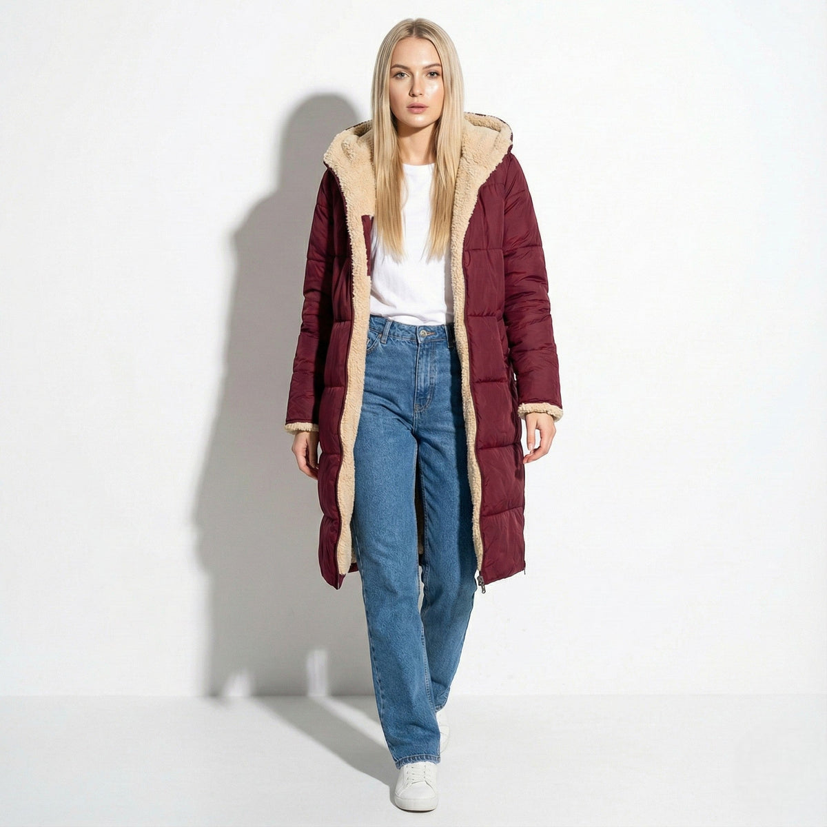 Long winter coat in wine red with sherpa-lined hood and cuffs, quilted zip front