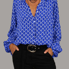 ELVIRA™ blue geometric V-neck blouse with long sleeves and front button placket.