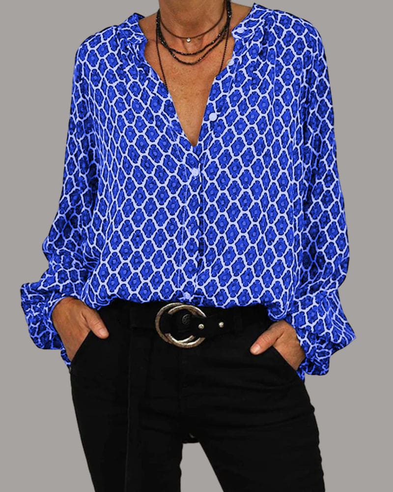 ELVIRA™ blue geometric V-neck blouse with long sleeves and front button placket.