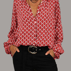 ELVIRA™ red geometric V-neck blouse with long sleeves and front button placket.