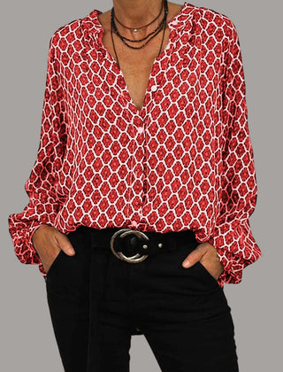 ELVIRA™ red geometric V-neck blouse with long sleeves and front button placket.