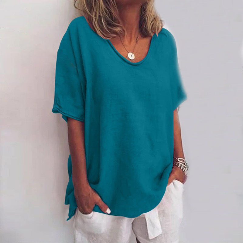 Loose fit scoop-neck top, teal short sleeves with draped side ties