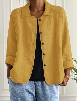 Warm ochre button-up blouse with stand collar and three-quarter sleeves