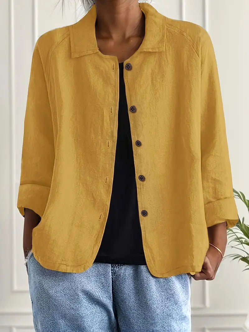 Warm ochre button-up blouse with stand collar and three-quarter sleeves