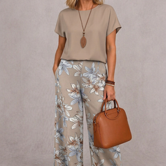 Beige short-sleeve top and light floral wide-leg pants set