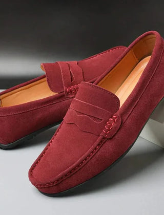 Suede loafers in maroon with penny-style strap and stitched moc toe