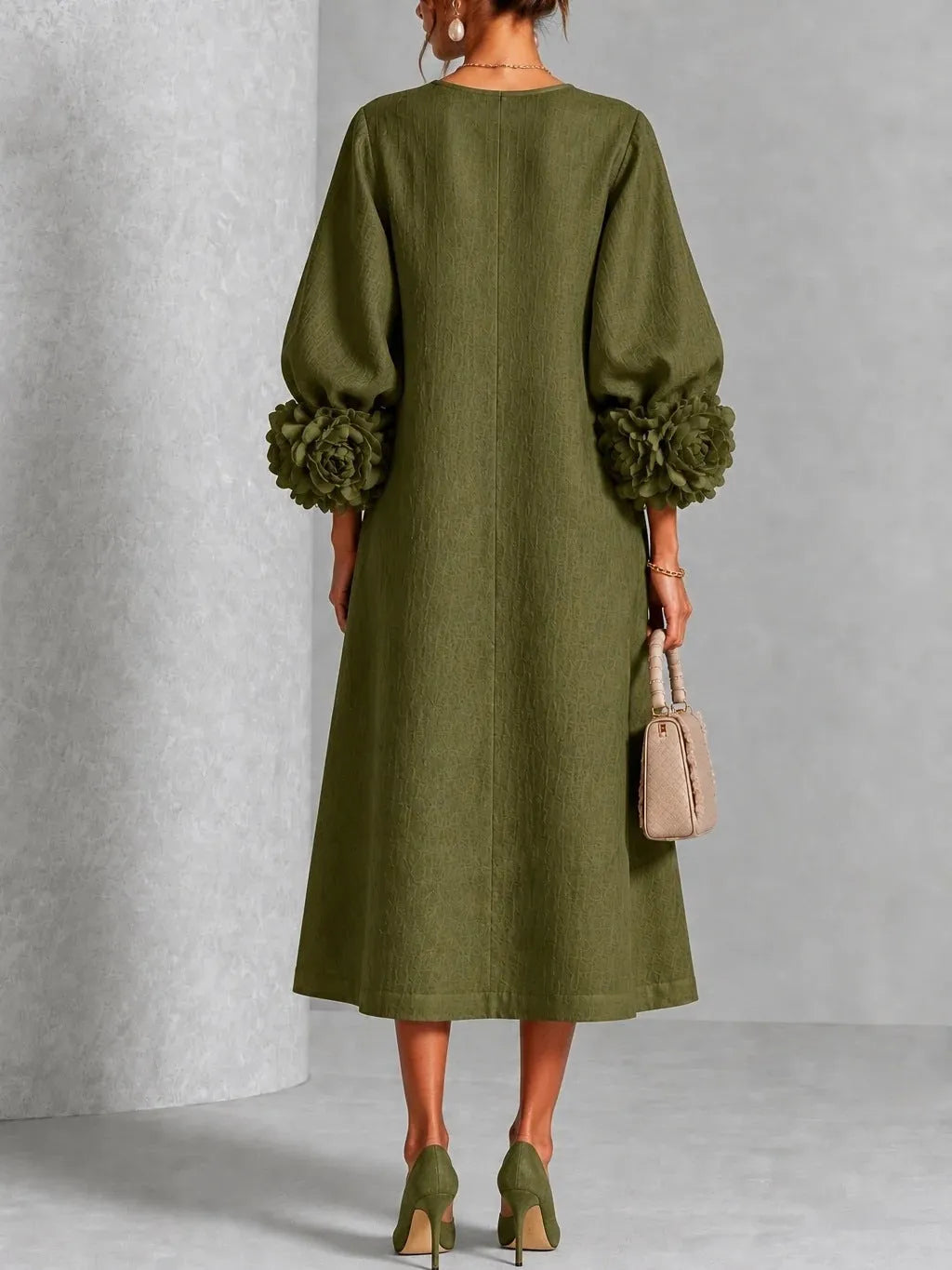 Olive floral midi dress back view with rose-cuff sleeves and button back placket