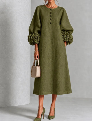 Olive floral midi dress with button front and rose-cuff puff sleeves, front view