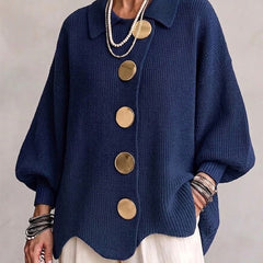 Oversized blue collared button cardigan with long balloon sleeves and large round buttons