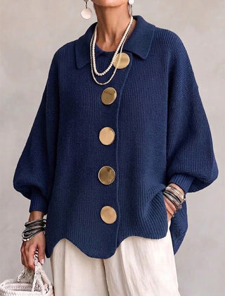 Oversized blue collared button cardigan with long balloon sleeves and large round buttons